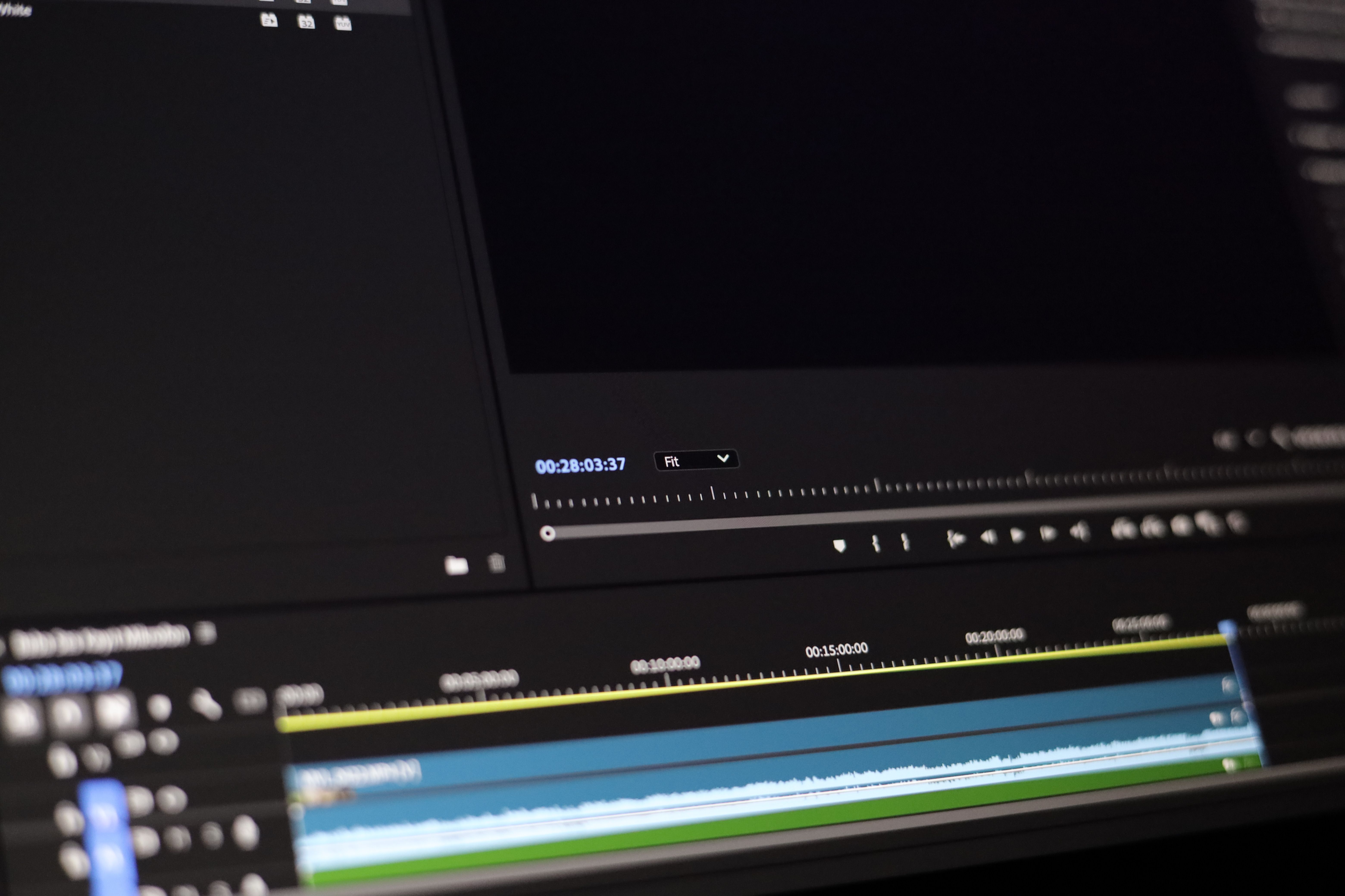 Close-up of a video editing timeline interface showing multiple clips and tracks.