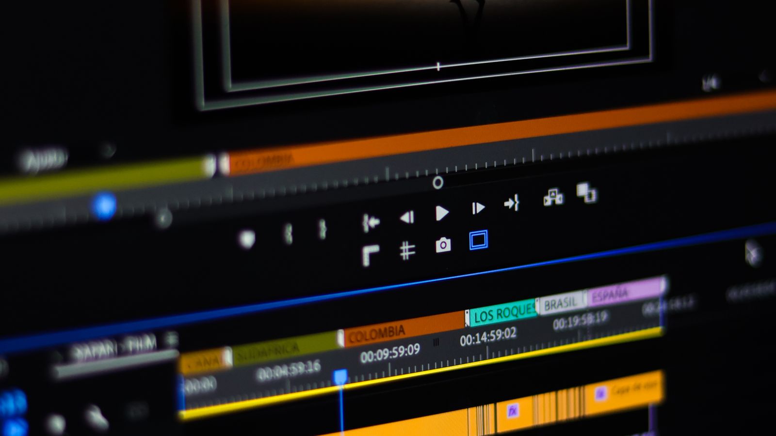 Close-up of video editing software on a monitor showing a timeline and preview window.